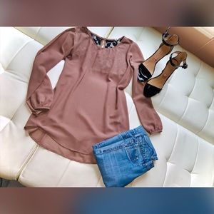 Tan blouse with black lace detail